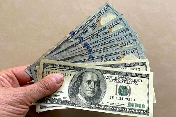 مالیات بر دلار چیست ؟